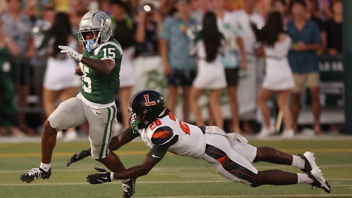 Lakeland defensive back Christopher Cresser (26) and his teammates did a great job containing North Carolina-bound speedster Jaden Jefferson (15) all night in De La Salle's 10-6 home win over Aug. 29, 2025. Jefferson found much more running room on Thursday with 161 yards rushing on just seven carries. Lakeland defensive back Christopher Cresser (26) and his teammates did a great job containing North Carolina-bound speedster Jaden Jefferson (15) all night in De La Salle's 10-6 home win over Aug. 29, 2025. Jefferson found much more running room on Thursday with 161 yards rushing on just seven carries.