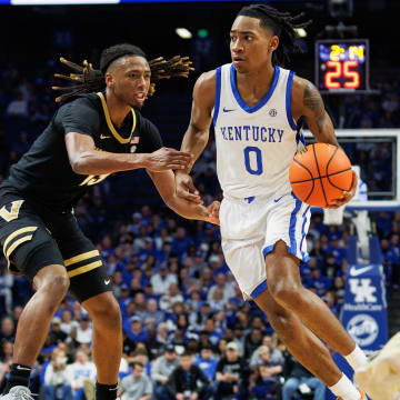 Mar 6, 2024; Lexington, Kentucky, USA; Kentucky Wildcats guard Rob Dillingham (0) drives to the basket during the second half against the Vanderbilt Commodores at Rupp Arena at Central Bank Center. 