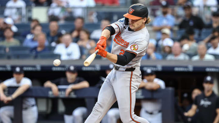 Jun 19, 2024; Bronx, New York, USA;  Baltimore Orioles shortstop Gunnar Henderson (2) hits a double in the first inning against the New York Yankees at Yankee Stadium. Mandatory Credit: Wendell Cruz-USA TODAY Sports