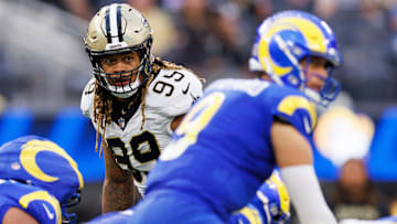 New Orleans Saints DE Chase Young (99) eyes Los Angeles Rams QB Matthew Stafford (9) on Nov. 2, 2025.