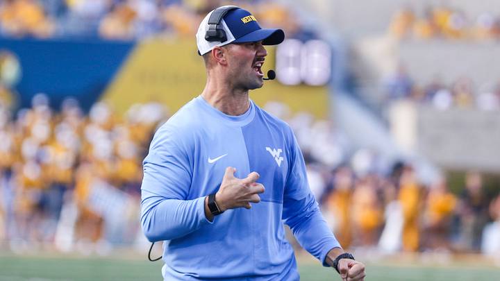 Sep 13, 2025; Morgantown, West Virginia, USA; West Virginia Mountaineers defensive coordinator  Zac Alley reacts during the third quarter against the Pittsburgh Panthers at Milan Puskar Stadium. Mandatory Credit: Ben Queen-Imagn Images