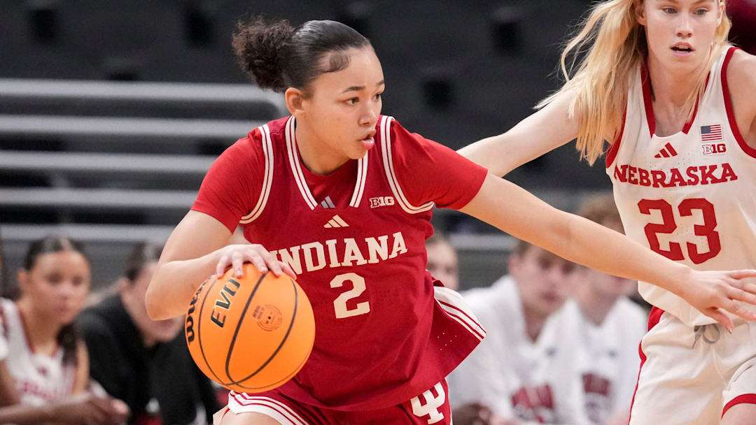 Indiana Hoosiers guard Nevaeh Caffey (2) pushes past Nebraska Cornhuskers guard Britt Prince (23) during the first half of a Big Ten women's basketball tournament game Wednesday, March 4, 2026, at Gainbridge Fieldhouse in Indianapolis.