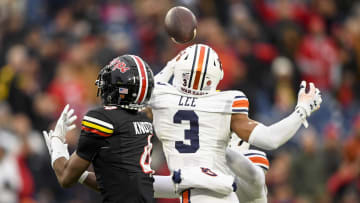 Dec 30, 2023; Nashville, TN, USA; Auburn Tigers cornerback Kayin Lee (3) deflects the pass thrown to Maryland Terrapins wide receiver Shaleak Knotts (4) during the second half at Nissan Stadium. Mandatory Credit: Steve Roberts-USA TODAY Sports