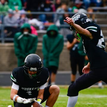 Holdingford football sophomore Tatum Manske kicks during the section semifinal versus Staples-Motley on Oct. 25, 2025. The Huskers won the home game 41-0
