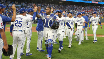 Jul 20, 2024; Kansas City, Missouri, USA; Kansas City Royals catcher Salvador Perez (13) celebrates with teammates after defeating the Chicago White Sox at Kauffman Stadium.