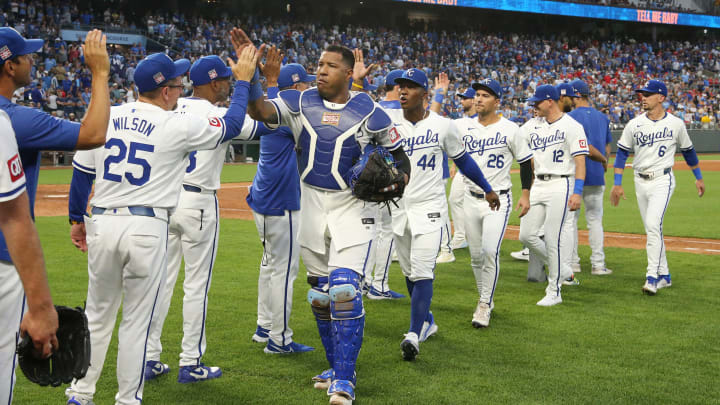 Jul 20, 2024; Kansas City, Missouri, USA; Kansas City Royals catcher Salvador Perez (13) celebrates with teammates after defeating the Chicago White Sox at Kauffman Stadium.