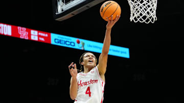 Nov 25, 2025; Las Vegas, NV, USA; Houston Cougars guard Kingston Flemings (4) goes for a layup in a 2025 Players Era Festival group play game against the Tennessee Volunteers during the first half at MGM Grand Garden Arena. Mandatory Credit: Stephen R. Sylvanie-Imagn Images