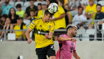 Aug 13, 2024; Columbus, Ohio, USA; Columbus Crew defender Yevhen Cheberko (21) heads the ball over Inter Miami CF defender Marcelo Weigandt (57) during the first half of the Leagues Cup round of 16 game at Lower.com Field. The Crew won 3-2.