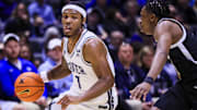 Xavier Musketeers guard Ryan Conwell (7) dribbles against the Providence Friars in the first half at Cintas Center.