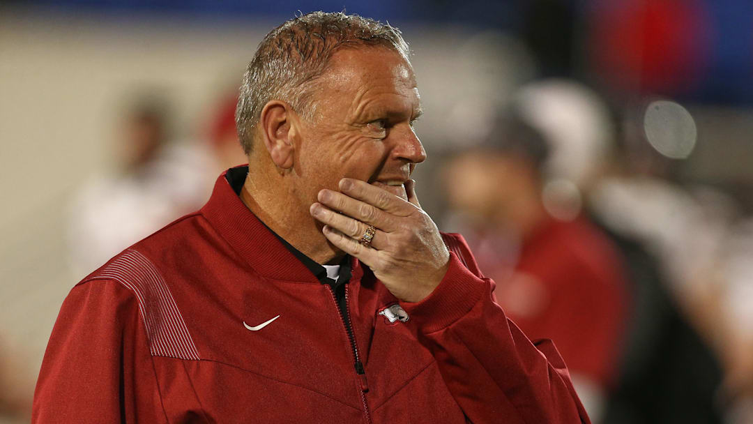 Dec 27, 2024; Memphis, TN, USA; Arkansas Razorbacks head coach Sam Pittman looks on during warm ups prior to the game against the Texas Tech Red Raiders at Simmons Bank Liberty Stadium. Mandatory Credit: Petre Thomas-Imagn Images