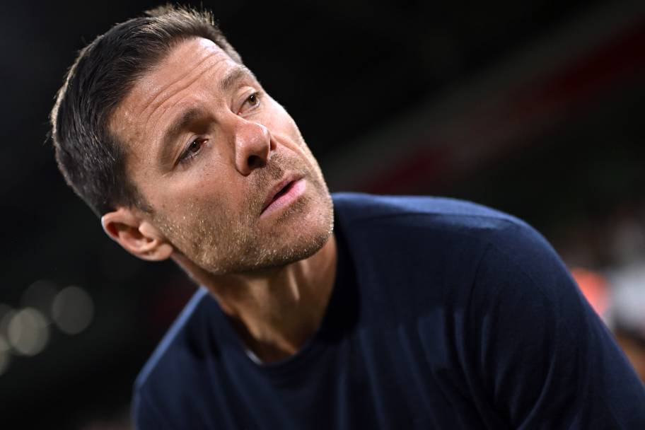 Xabi Alonso peering.