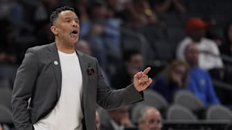 Mar 12, 2025; Charlotte, NC, USA; Georgia Tech Yellow Jackets head coach Damon Stoudamire calls to his team during the first half against the Virginia Cavaliers at Spectrum Center. Mandatory Credit: Jim Dedmon-Imagn Images