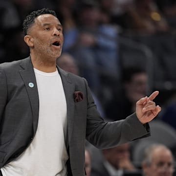 Mar 12, 2025; Charlotte, NC, USA; Georgia Tech Yellow Jackets head coach Damon Stoudamire calls to his team during the first half against the Virginia Cavaliers at Spectrum Center. Mandatory Credit: Jim Dedmon-Imagn Images