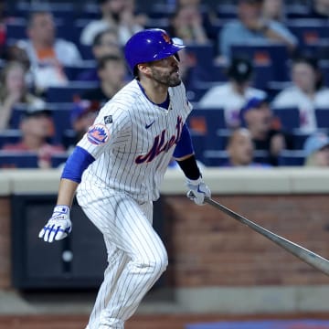 New York Mets designated hitter J.D. Martinez (28) watches his ninth inning walkoff two run home run against the Miami Marlins at Citi Field on June 13.