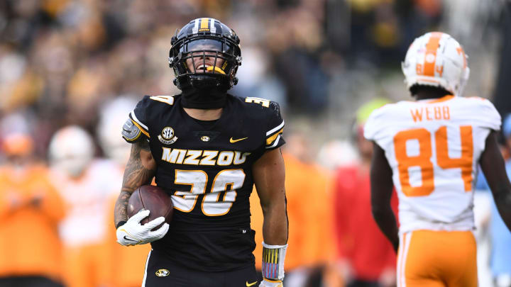 Missouri linebacker Chuck Hicks (30) celebrating after recovering a Tennessee fumble during an NCAA college football game on Saturday, November 11, 2023 in Columbia, MO.