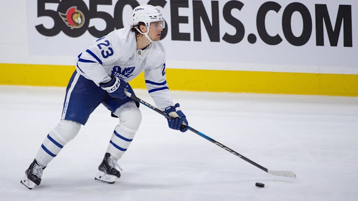 Sep 24, 2024; Ottawa, Ontario, CAN; Toronto Maple Leafs left swing Matthew Knies (23) skates with the puck in the third period against the Ottawa Senators at the Canadian Tire Centre. Mandatory Credit: Marc DesRosiers-Imagn Images