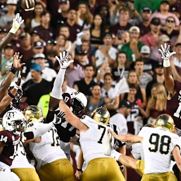 Aug 31, 2024; College Station, Texas, USA; Texas A&M Aggies defensive lineman Shemar Stewart (4) attempts to block the kicks during the second quarter against the Notre Dame Fighting Irish at Kyle Field. Mandatory Credit: Maria Lysaker-Imagn Images