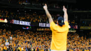 Seattle Mariners starting pitcher Felix Hernandez (34) celebrates with fans following a 3-1 loss against the Oakland Athletics at T-Mobile Park in 2019.