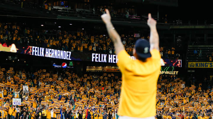 Seattle Mariners starting pitcher Felix Hernandez (34) celebrates with fans following a 3-1 loss against the Oakland Athletics at T-Mobile Park in 2019.