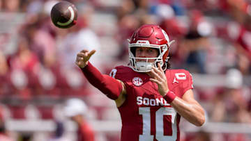 Oklahoma Sooners quarterback John Mateer (10) warms up before a college football game between the University of Oklahoma Sooners (OU) and the Auburn Tigers at Gaylord Family Ð Oklahoma Memorial Stadium in Norman, Okla., Saturday, Sept. 20, 2025.