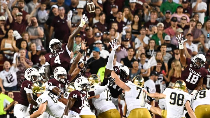 Aug 31, 2024; College Station, Texas, USA; Texas A&M Aggies defensive lineman Shemar Stewart (4) attempts to block the kicks during the second quarter against the Notre Dame Fighting Irish at Kyle Field. 