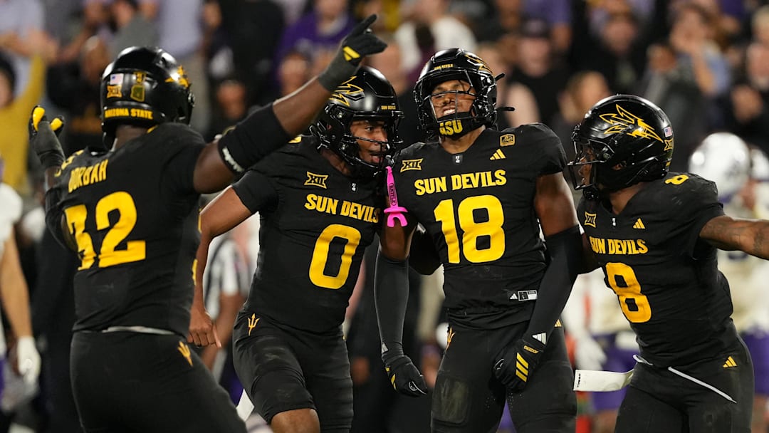 Sep 26, 2025; Tempe, Arizona, USA; Arizona State Sun Devils linebacker Martell Hughes (18) celebrates a game-winning interception with defensive lineman Prince Dorbah (32), defensive back Rodney Bimage Jr. (0) and linebacker Jordan Crook (8) against TCU Horned Frogs in the second half at Mountain America Stadium, Home of the ASU Sun Devils. Mandatory Credit: Jacob Reiner-Imagn Images