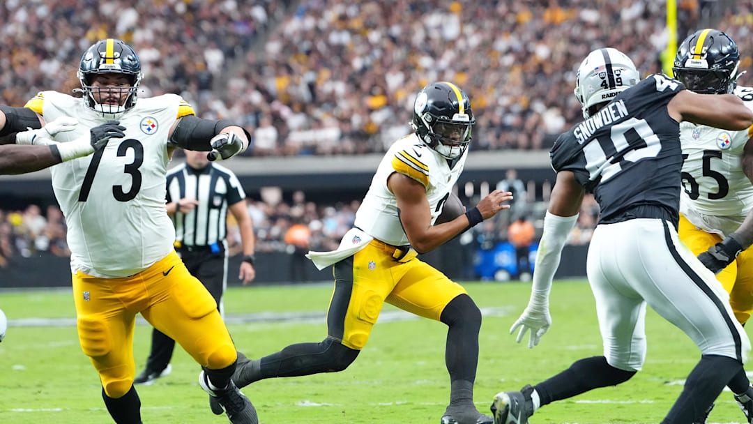 Oct 13, 2024; Paradise, Nevada, USA; Pittsburgh Steelers quarterback Justin Fields (2) gains yardage against the Las Vegas Raiders during the second quarter at Allegiant Stadium. Mandatory Credit: Stephen R. Sylvanie-Imagn Images