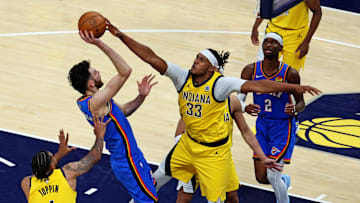 Jun 11, 2025; Indianapolis, Indiana, USA; Indiana Pacers center Myles Turner (33) blocks the shot of Oklahoma City Thunder forward Chet Holmgren (7) during the fourth quarter in game three of the 2025 NBA Finals at Gainbridge Fieldhouse. Mandatory Credit: Trevor Ruszkowski-Imagn Images