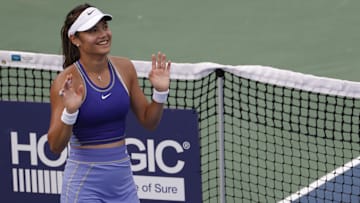 Emma Raducanu waves to the crowd after her match.