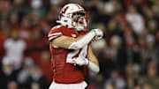 Wisconsin Badgers safety Hunter Wohler (24) celebrates following a play during the third quarter against the Northwestern Wildcats at Camp Randall Stadium.