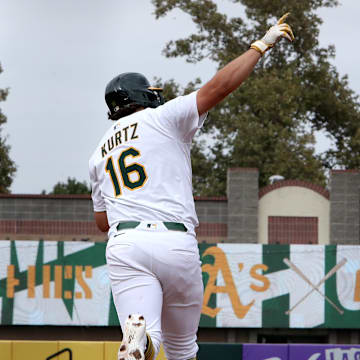 Sep 28, 2025; West Sacramento, California, USA; Athletics first baseman Nick Kurtz (16) reacts after hitting a two-run home run against the Kansas City Royals during the eighth inning at Sutter Health Park. Mandatory Credit: Dennis Lee-Imagn Images
