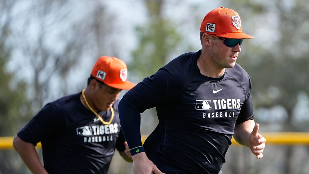 Detroit Tigers infielders Spencer Torkelson Hao-Yu Lee warm up during spring training at TigerTown in 2025.