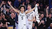 Feb 22, 2025; New York, NY, USA;  Duke Blue Devils guards Tyrese Proctor (5) and Cooper Flagg (2) celebrate from the bench in the second half against the Illinois Fighting Illini at Madison Square Garden. Mandatory Credit: Wendell Cruz-Imagn Images