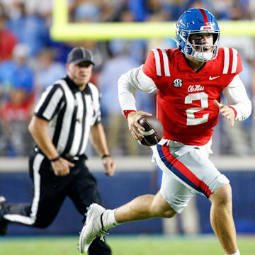 Oct 28, 2023; Oxford, Mississippi, USA; Mississippi Rebels quarterback Jaxson Dart (2) runs the ball  during the first half against the Vanderbilt Commodores at Vaught-Hemingway Stadium. Mandatory Credit: Petre Thomas-Imagn Images