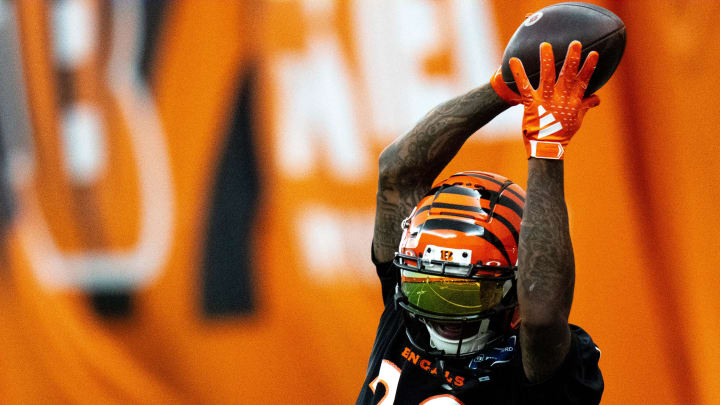 Cincinnati Bengals cornerback Cam Taylor-Britt (29) catches a pass during an interception drill at Bengals spring practice at the IEL Indoor Facility in Cincinnati on Tuesday, June 11, 2024.