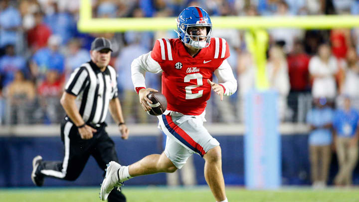 Oct 28, 2023; Oxford, Mississippi, USA; Mississippi Rebels quarterback Jaxson Dart (2) runs the ball  during the first half against the Vanderbilt Commodores at Vaught-Hemingway Stadium. Mandatory Credit: Petre Thomas-Imagn Images