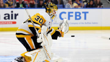 Sep 21, 2024; Buffalo, New York, USA;  Pittsburgh Penguins goalie Joel Blomqvist (30) looks to make a save during the second period against the Buffalo Sabres at KeyBank Center. Mandatory Credit: Timothy T. Ludwig-Imagn Images