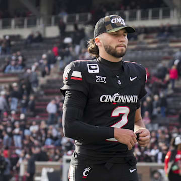 Nov 15, 2025; Cincinnati, Ohio, USA;  Cincinnati Bearcats quarterback Brendan Sorsby walks off the field after his team’s loss to the Arizona Wildcats at Nippert Stadium. Mandatory Credit: Aaron Doster-Imagn Images