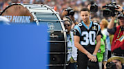 Feb 7, 2016; Santa Clara, CA, USA; Golden State Warriors guard Stephen Curry prepares to pound the drum prior to the game between the Carolina Panthers and the Denver Broncos in Super Bowl 50 at Levi's Stadium. Mandatory Credit: Kyle Terada-Imagn Images