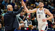 Jan 2, 2024; Storrs, Connecticut, USA; Connecticut Huskies head coach Dan Hurley congratulates forward Alex Karaban (11) coming off the court as they take on the DePaul Blue Demons at Harry A. Gampel Pavilion. Mandatory Credit: David Butler II-Imagn Images