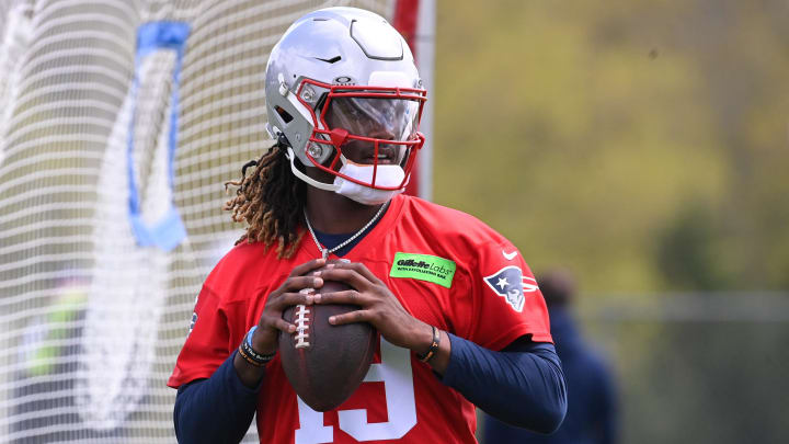 May 11, 2024; Foxborough, MA, USA; New England Patriots quarterback Joe Milton III (19) throws a pass at the New England Patriots rookie camp at Gillette Stadium.  Mandatory Credit: Eric Canha-USA TODAY Sports