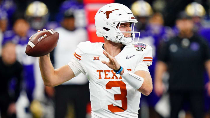 Jan 1, 2024; New Orleans, LA, USA; Texas Longhorns quarterback Quinn Ewers (3) throws a pass during the first quarter against the Washington Huskies in the 2024 Sugar Bowl college football playoff semifinal game at Caesars Superdome