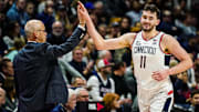 Jan 2, 2024; Storrs, Connecticut, USA; Connecticut Huskies head coach Dan Hurley congratulates forward Alex Karaban (11) coming off the court as they take on the DePaul Blue Demons at Harry A. Gampel Pavilion. Mandatory Credit: David Butler II-Imagn Images