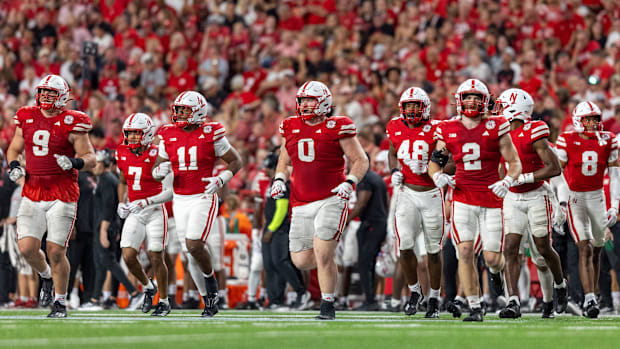 The Blackshirts take the field for overtime against Illinois.