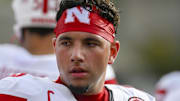 Oct 11, 2025; College Park, Maryland, USA;  Nebraska Cornhuskers quarterback Dylan Raiola (15) walks the sidelines during the first half against the Maryland Terrapins at SECU Stadium. 