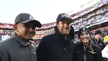 Dec 14, 2024; Landover, Maryland, USA;  Dave Portnoy poses with solders before the between the Army Black Knights and the Navy Midshipmen  at Commanders Field. Mandatory Credit: Tommy Gilligan-Imagn Images