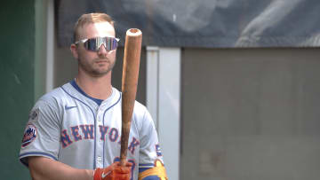 Jul 7, 2024; Pittsburgh, Pennsylvania, USA;  New York Mets first baseman Pete Alonso (20) prepares in the dugout before batting against the Pittsburgh Pirates during the sixth inning at PNC Park. The Mets won 3-2. Mandatory Credit: Charles LeClaire-USA TODAY Sports
