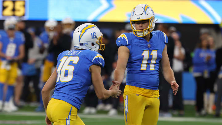 Dec 23, 2023; Inglewood, California, USA;  Los Angeles Chargers place kicker Cameron Dicker (11) celebrates with punter JK Scott (16) after making a field goal during the first quarter against the Buffalo Bills at SoFi Stadium. Mandatory Credit: Kiyoshi Mio-USA TODAY Sports