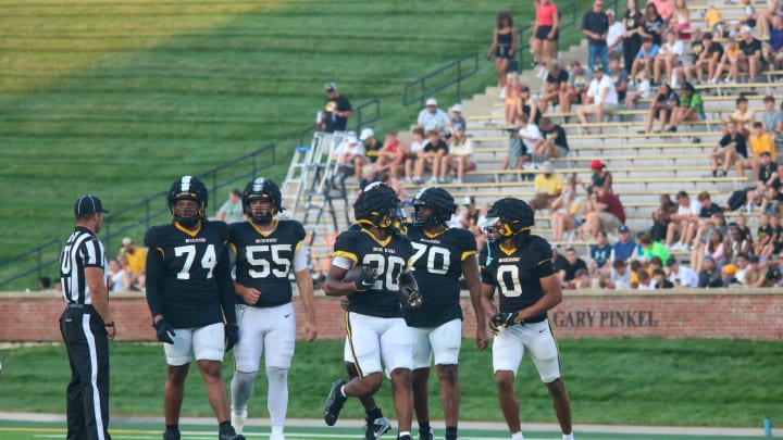 August 17, 2024; Columbia, Mo; Backup Missouri running back Jamal Roberts (20, Center) surrounded by offensive linemen Cam'Ron Johnson (74, far left), Connor Tollison (55, left), Cayden Green (70. right) and receiver Joshua Manning (0, far right). / Amber Winkler / MissouriOnSi