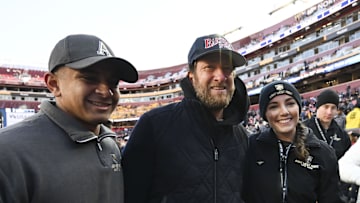 Dec 14, 2024; Landover, Maryland, USA;  Dave Portnoy poses with solders before the between the Army Black Knights and the Navy Midshipmen  at Commanders Field. Mandatory Credit: Tommy Gilligan-Imagn Images